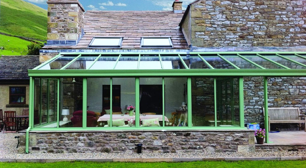 Green lean-to conservatory with Smartglass glazing